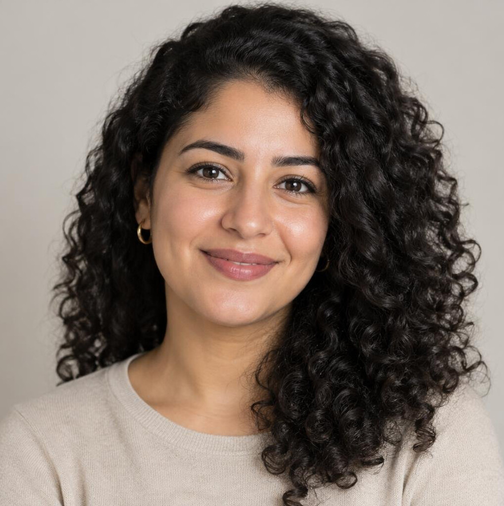Portrait of a young woman with curly hair