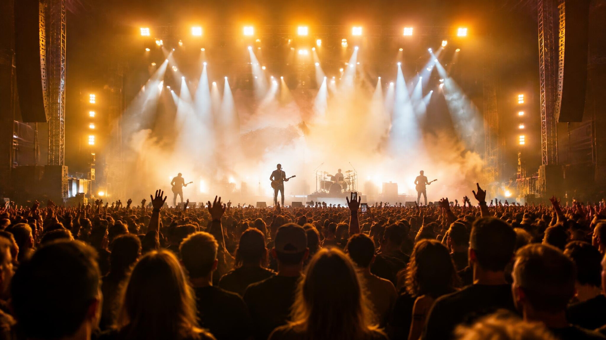 Crowd at a concert with stage lights